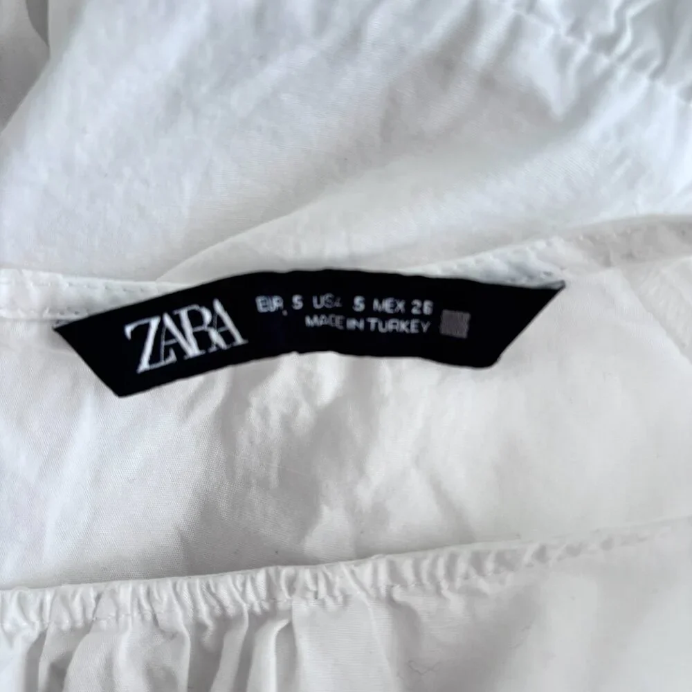 Zara White Embroidered Lace Sleeve Peplum Top